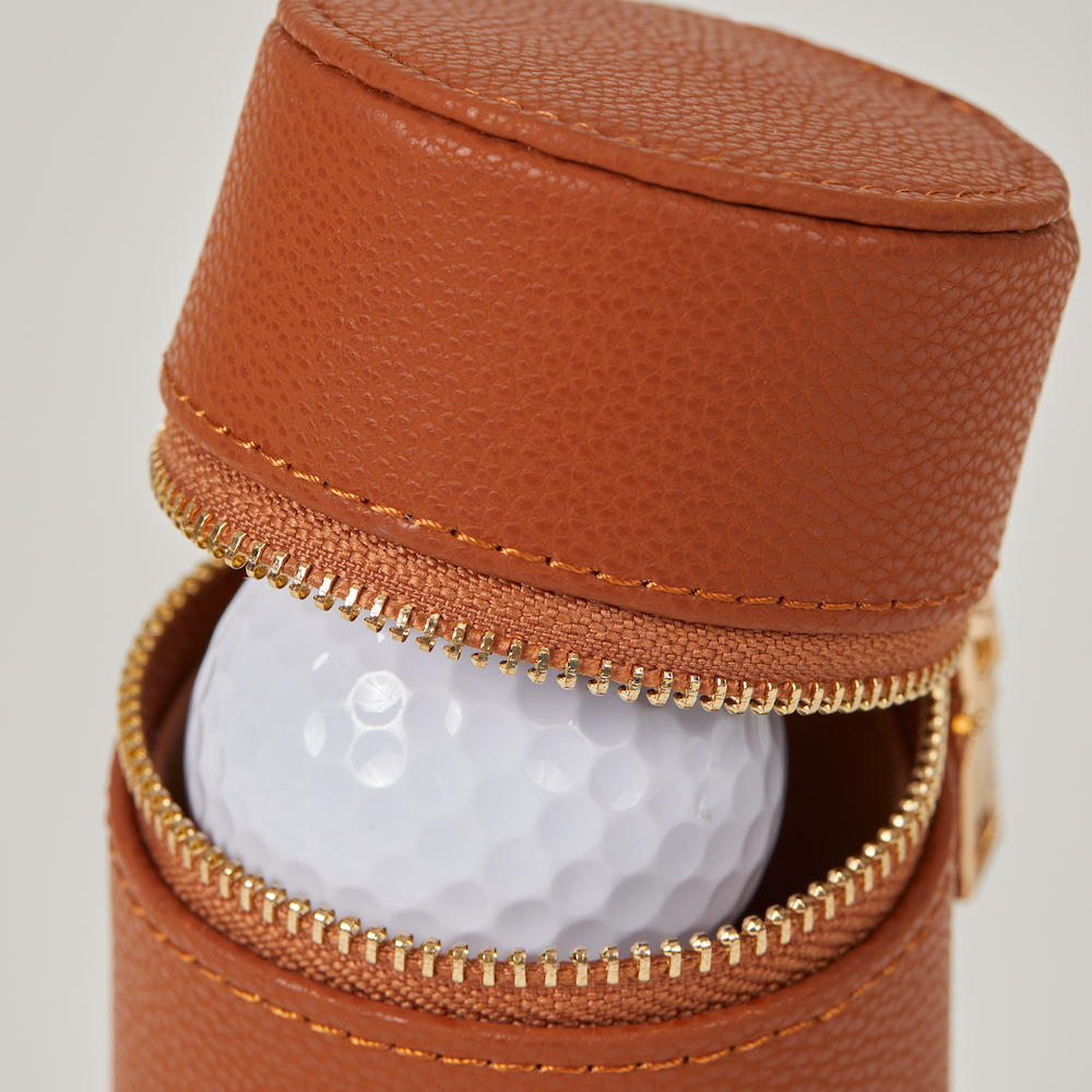 Golf ball inside leather golf ball holder