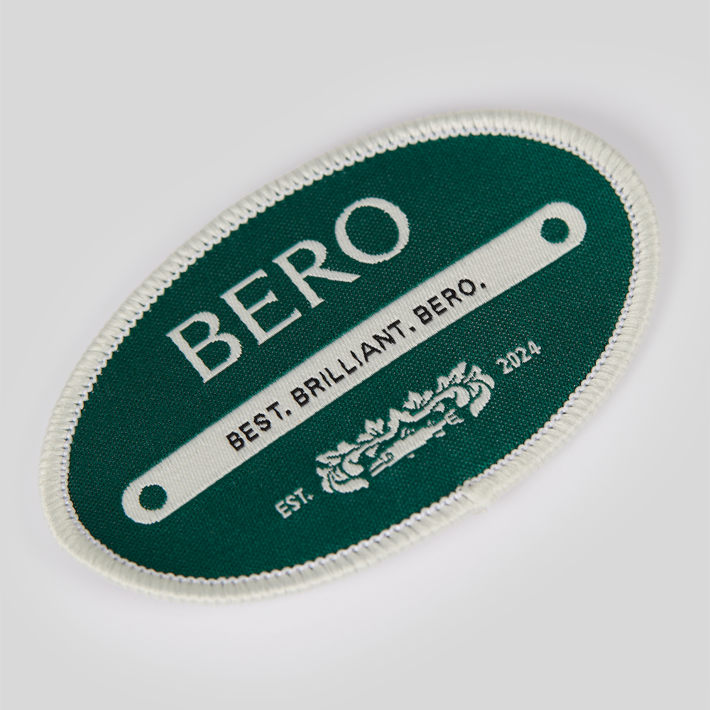 Green and white patch with 'BERO' branding on a light gray background
