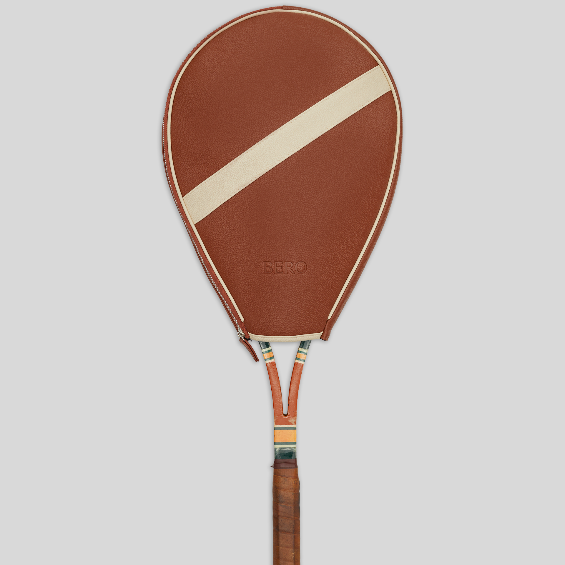 Full view of leather racquet cover with wooden racquet inside