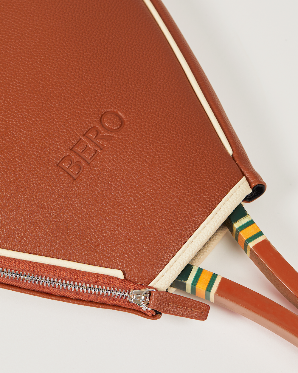 Closeup of leather BERO tennis racquet cover