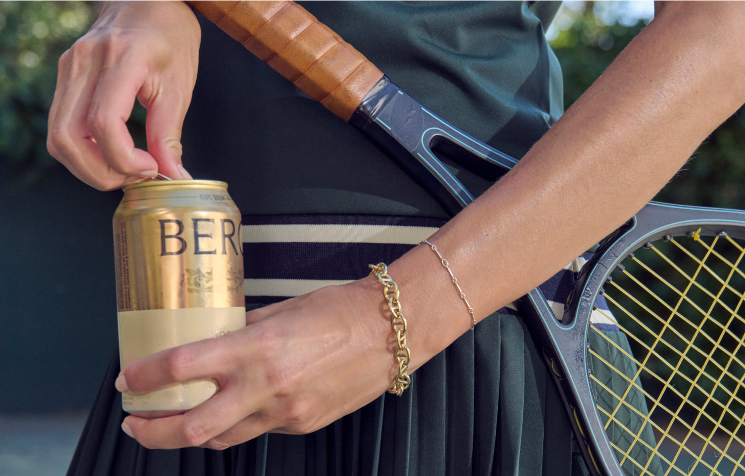 Tennis player opening Noon Wheat can 