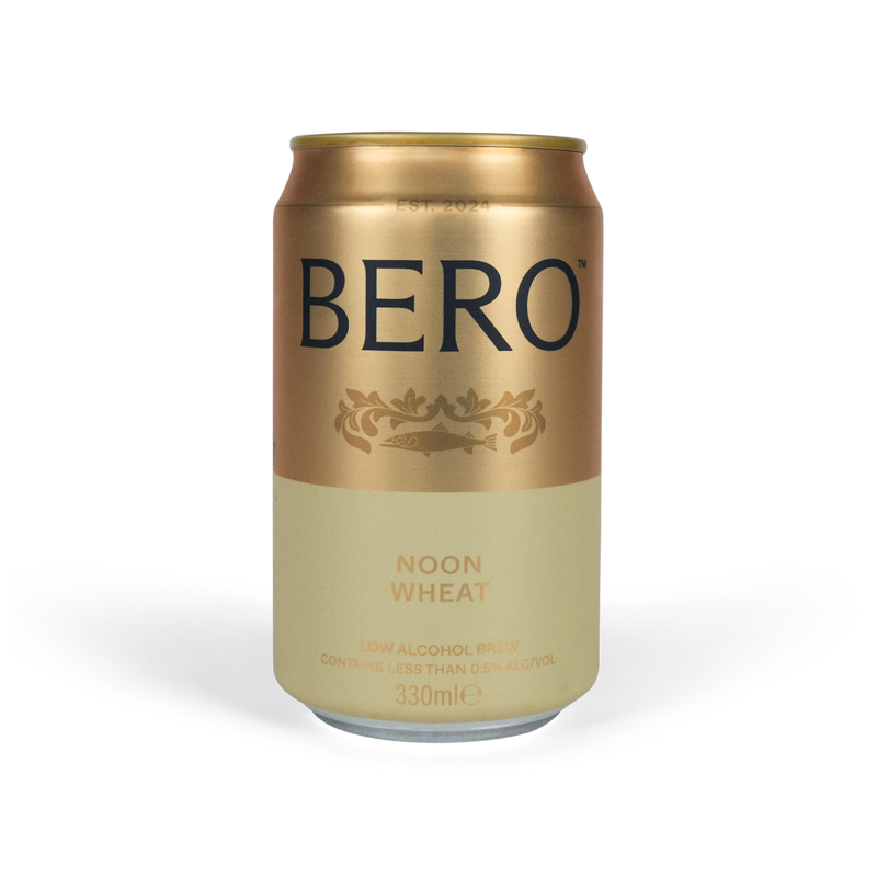BERO Noon Wheat non-alcoholic beer can in gold and cream design on white background
