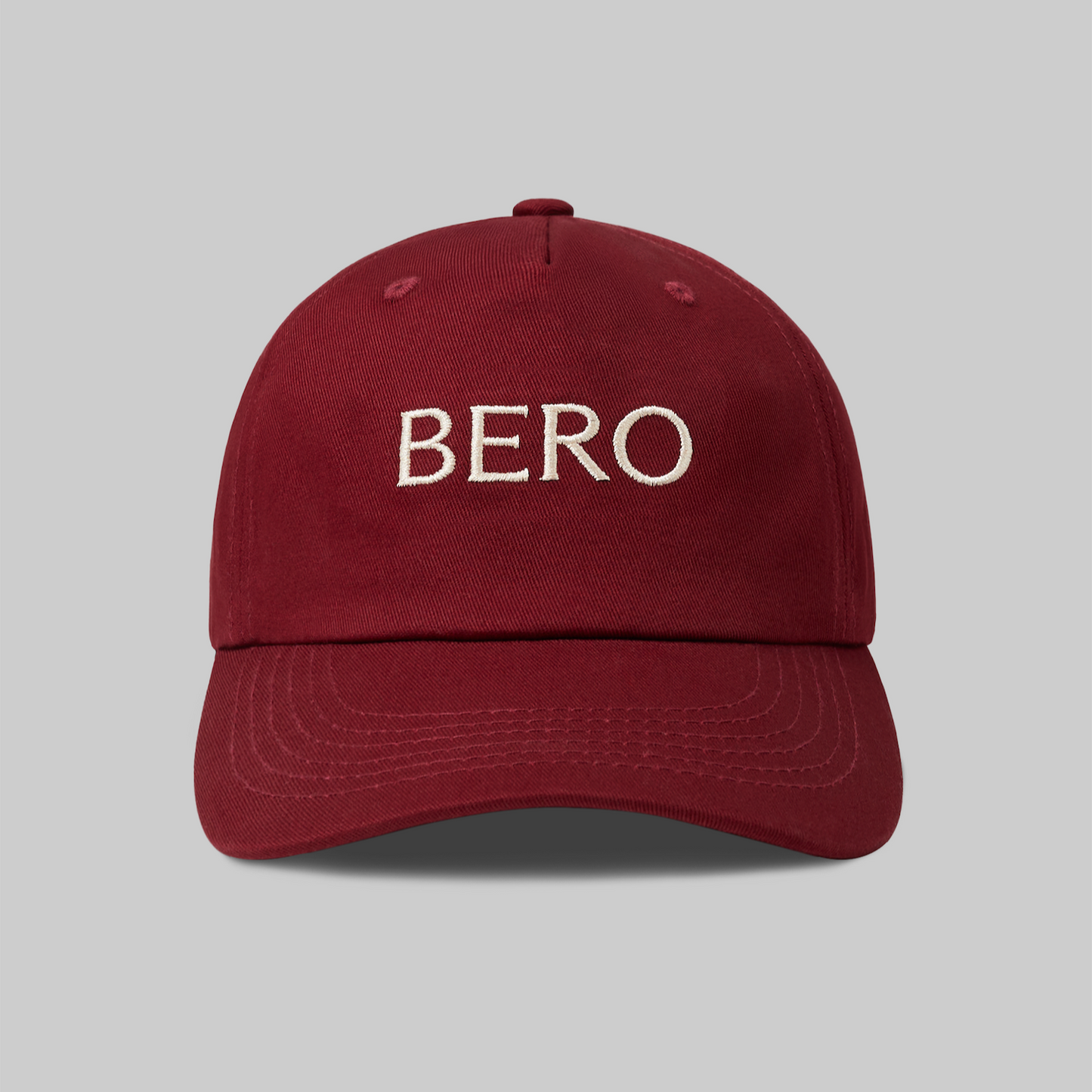 Front of maroon BERO baseball cap