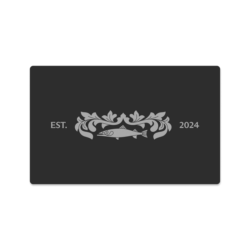 Black gift card with silver ornate design featuring a fish motif and "EST. 2024" text
