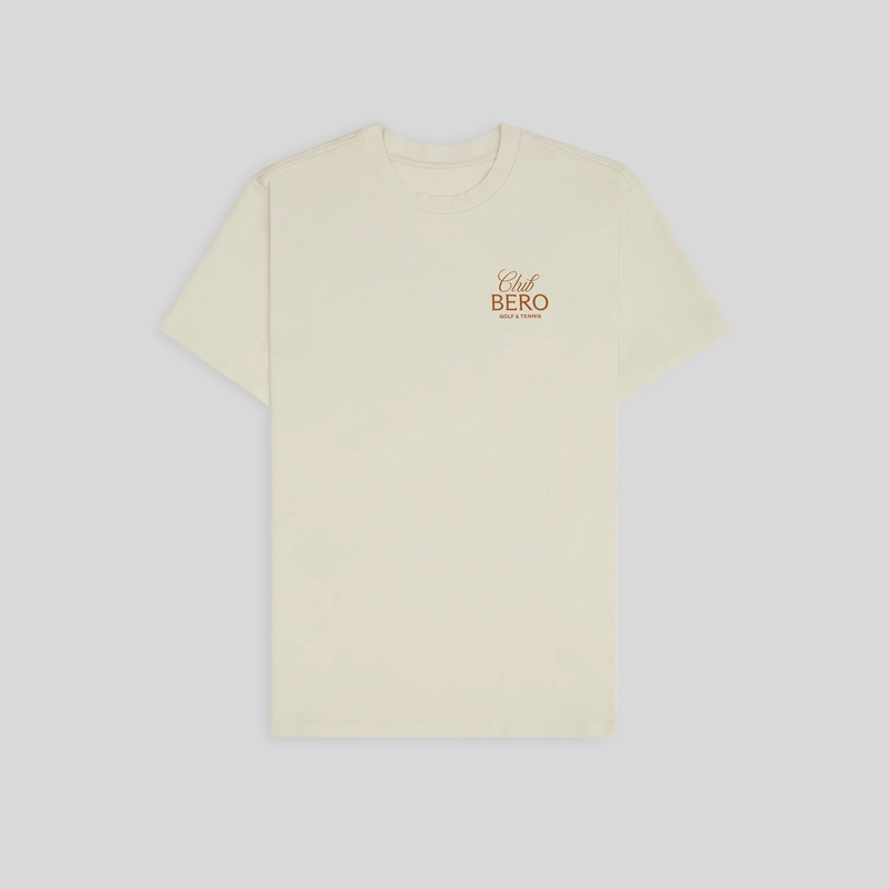 Cream-colored t-shirt with "Club BERO Golf & Tennis" logo in brown text on chest