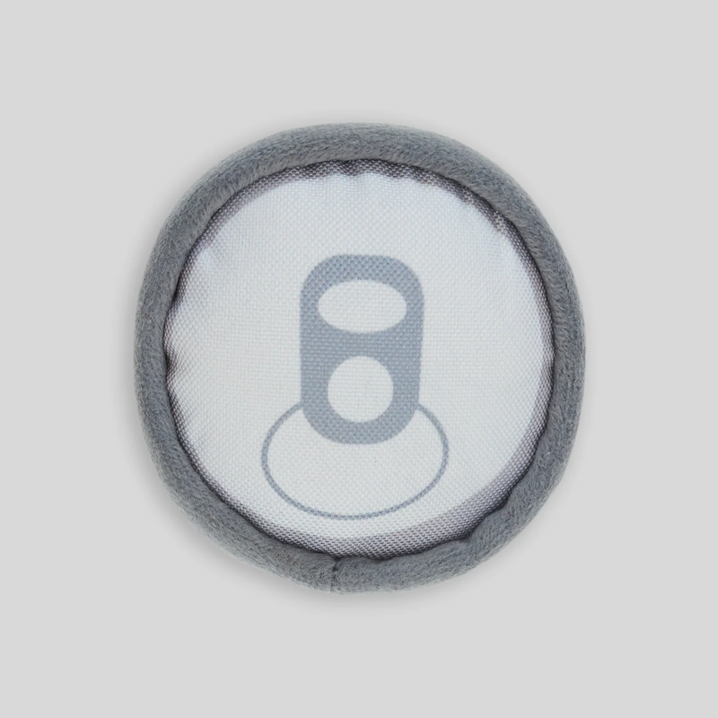 Round gray fabric dog toy with white mesh center displaying the letter "a