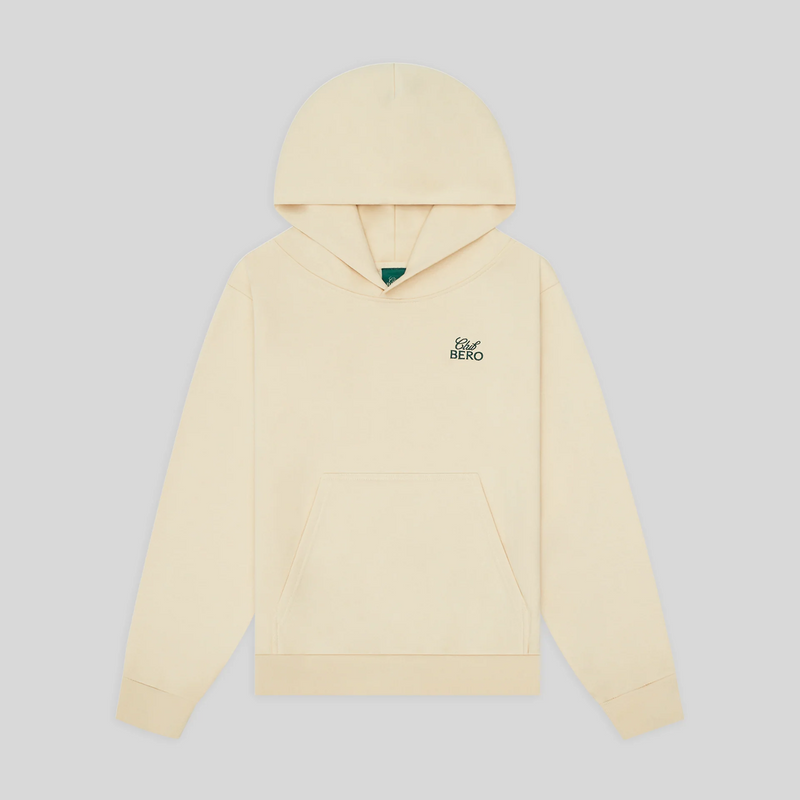 Cream-colored pullover hoodie with small BERO logo on chest, laid flat against gray background