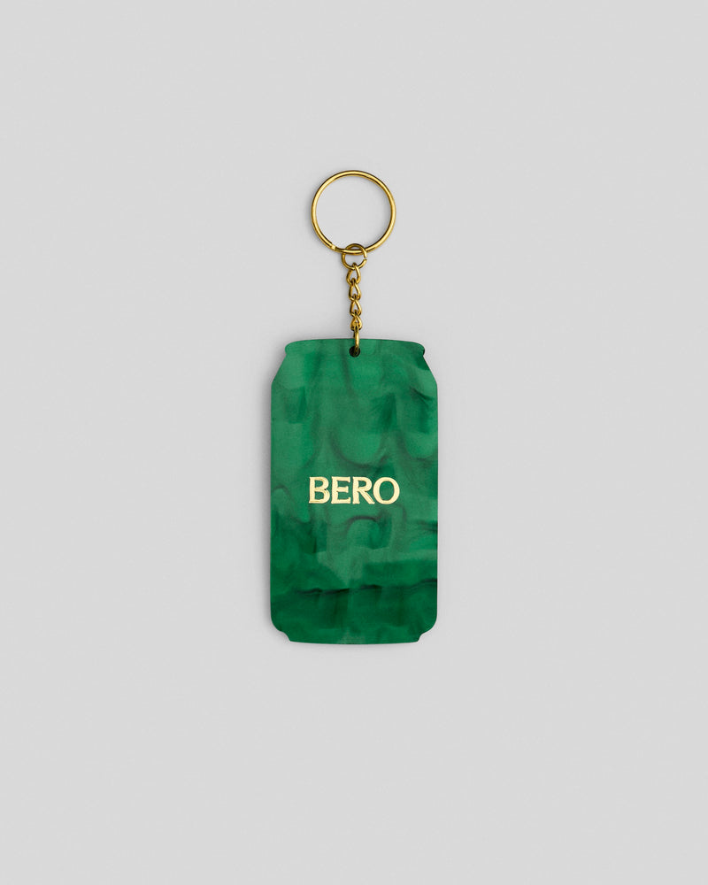 Green textured keychain with gold chain and ring, featuring "BERO" text in white letters
