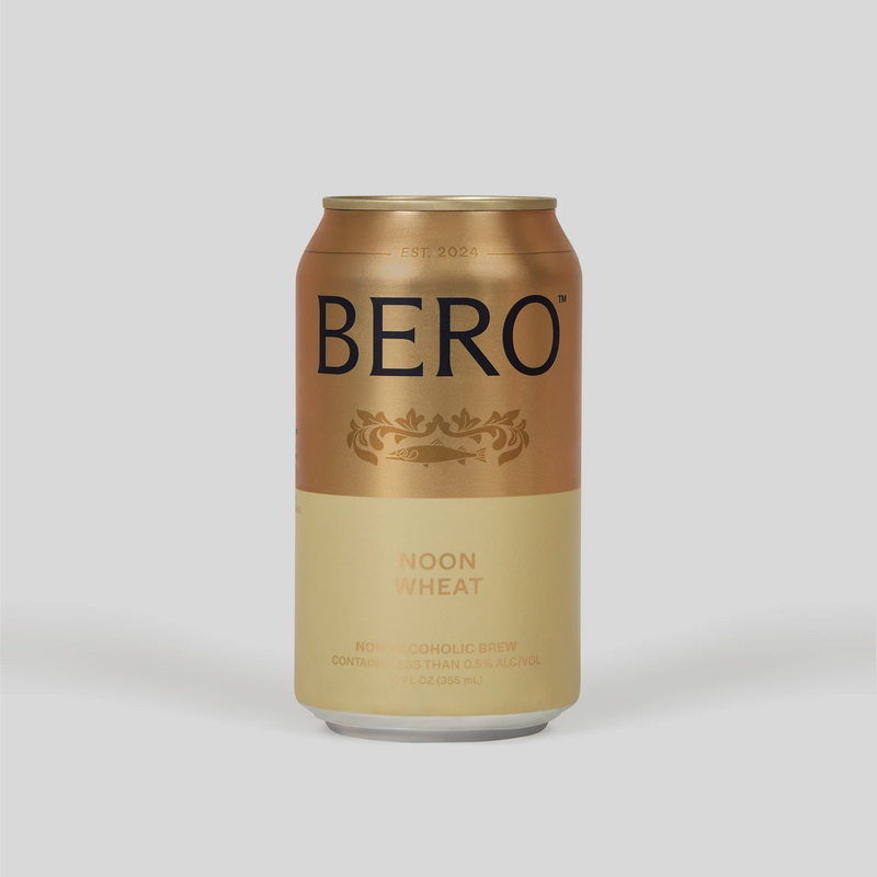 BERO Noon Wheat non-alcoholic beer can with gold and cream color scheme on light background