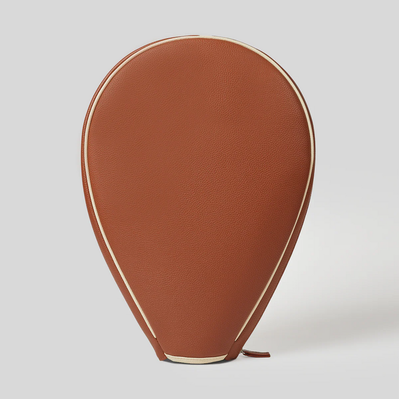 Brown leather tennis racquet cover with cream piping, teardrop-shaped design shown from the side