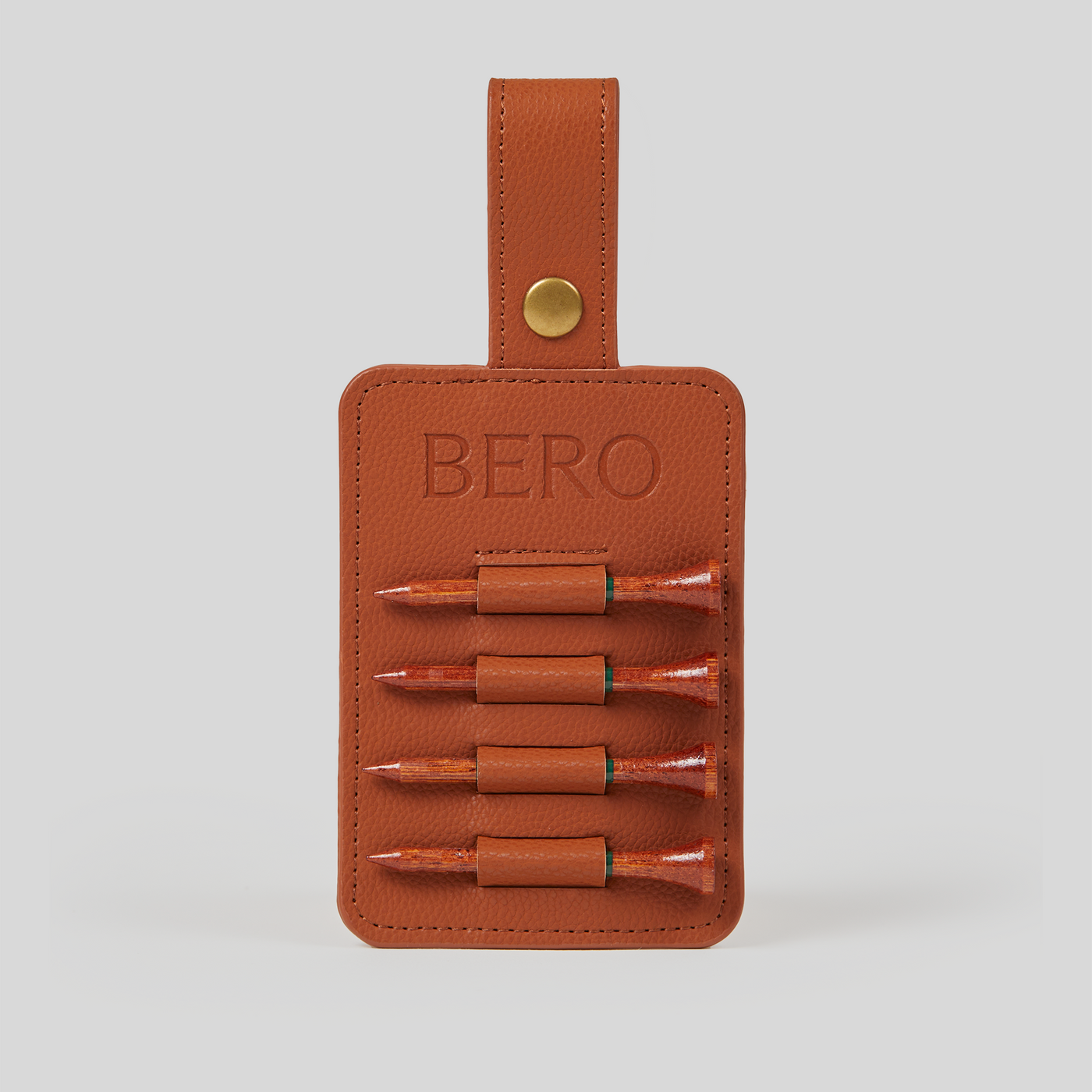 Front of BERO tournament tee holder with four branded golf tees