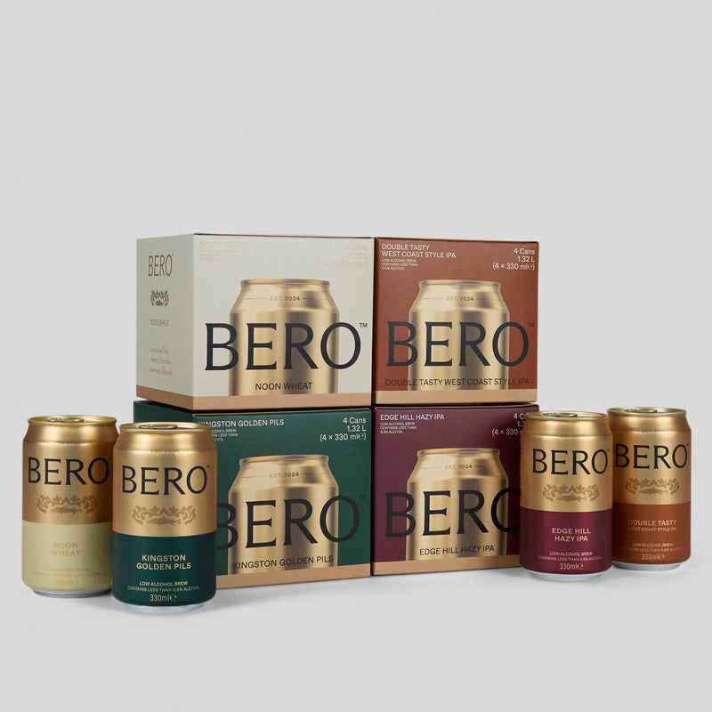 BERO beer cans and 4-pack cartons on a light gray background